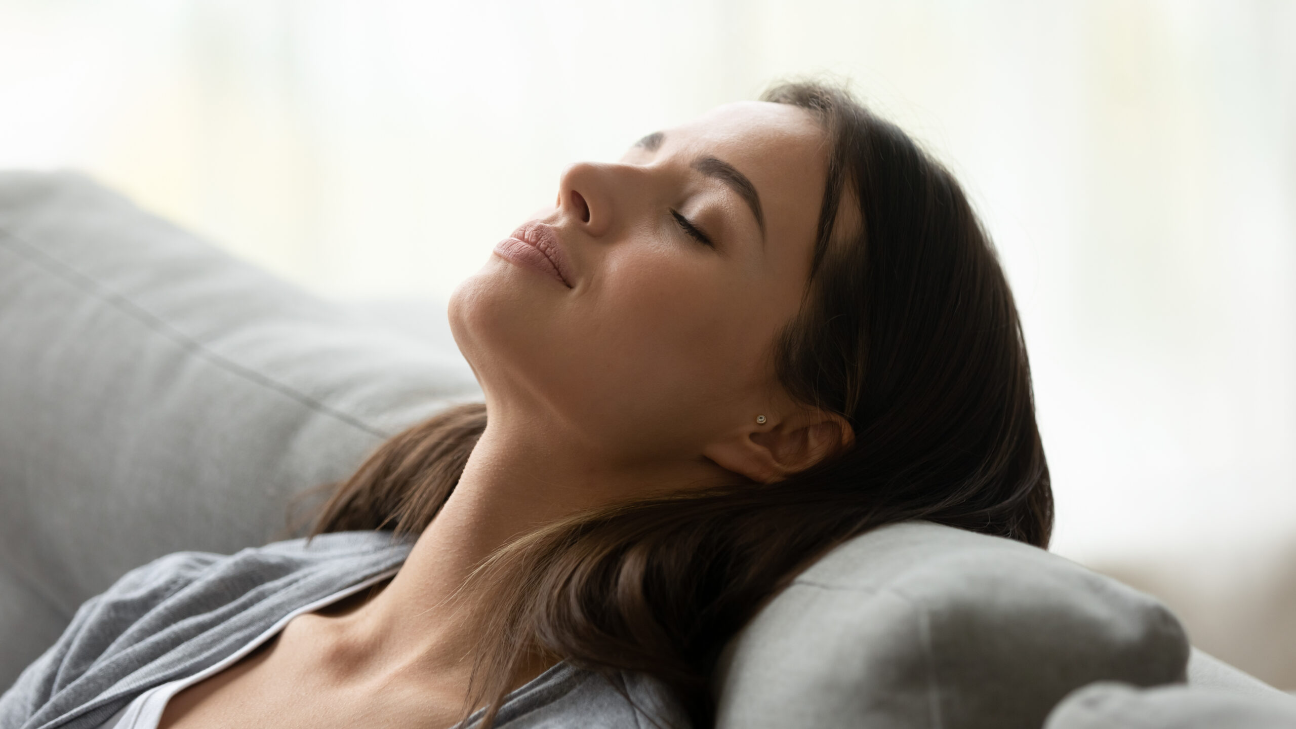 woman breathing in fresh air